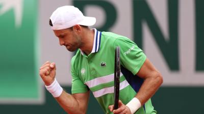 Grigor Dimitrov Dominates in Second Round at Roland Garros